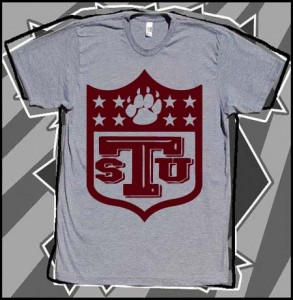 A t shirt with the letters stu on it