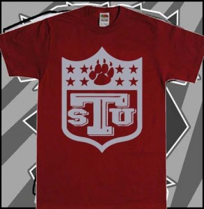 A red shirt with the letters stu on it