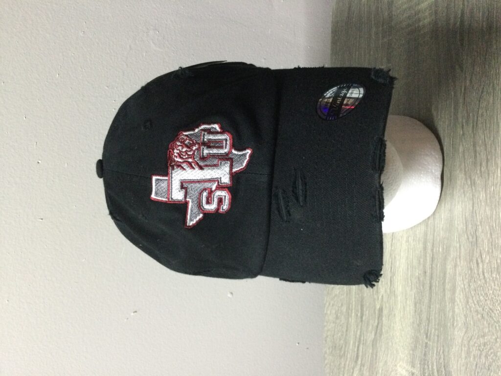 A t-shirt with the faces of many people.