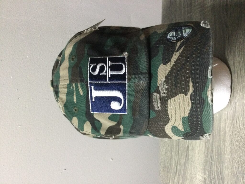 A t-shirt with the faces of many people.